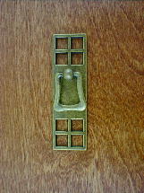 antique brass smooth backplate w/drop bail pull