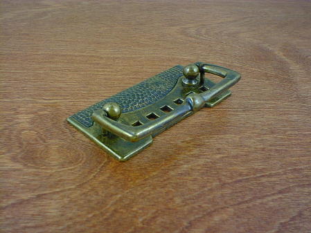 old brass anviled backplate w/drop handle