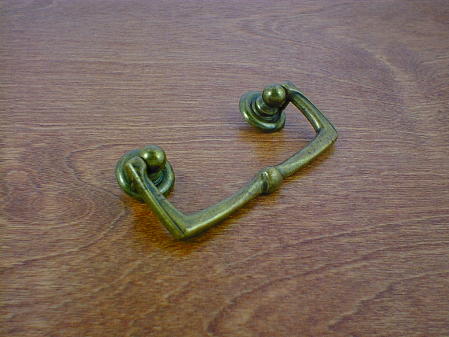 old brass anviled backplate w/drop bail pull