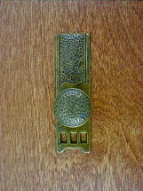 old brass anviled backplate w/round button knob
