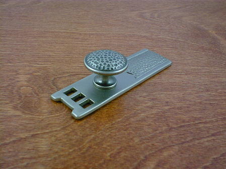 old iron anviled backplate w/round button knob