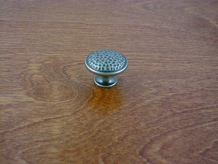 old iron anviled top round button knob