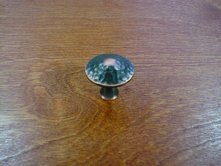 highlighted bronze finish peened top round knob