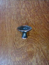 highlighted bronze finish peened top round knob